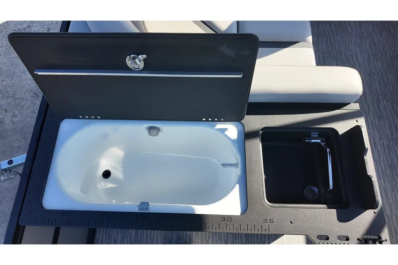 Slide: The Image of Viaggio Lago X-R 22 boat sink and storage compartment, 2026 model, featuring sleek design. - 11