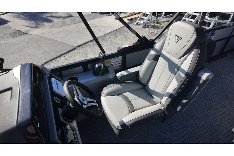 Slide: The Image of Captain's seat and steering wheel of 2026 Viaggio Lago X-R 22 boat. - 14