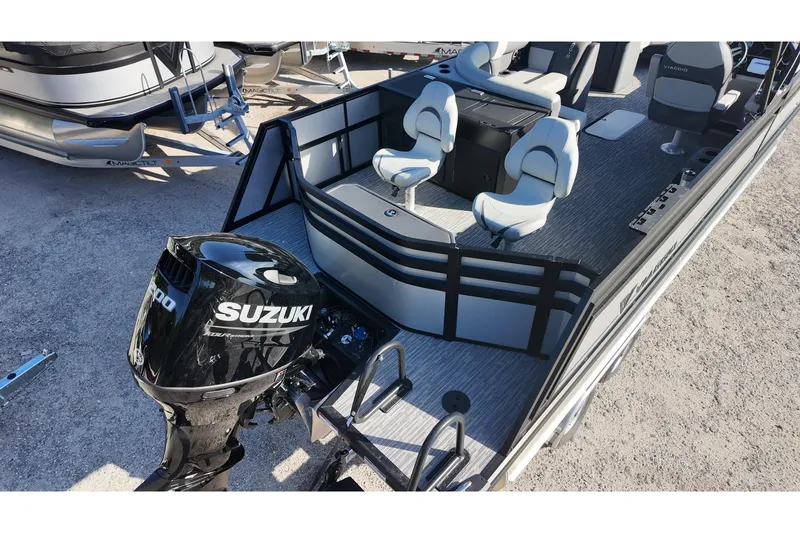 Slide: The Image of 2026 Viaggio Lago X-R 22 boat with Suzuki outboard motor, featuring modern seating and design. - 3