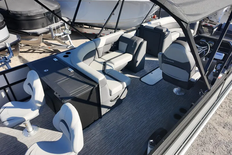 Slide: The Image of 2026 Viaggio Lago X-R 22 pontoon boat interior with modern seating and helm. - 4