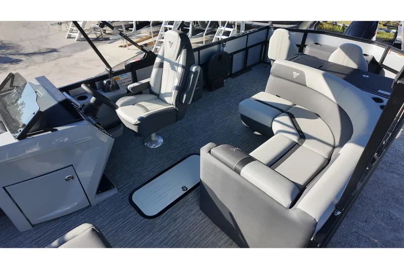 Slide: The Image of Interior of 2026 Viaggio Lago X-R 22 boat with modern seating and helm. - 8