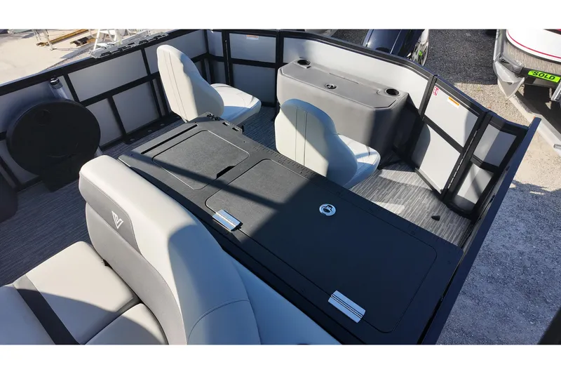 Slide: The Image of Interior of 2026 Viaggio Lago X-R 22 boat with modern seating and storage. - 9