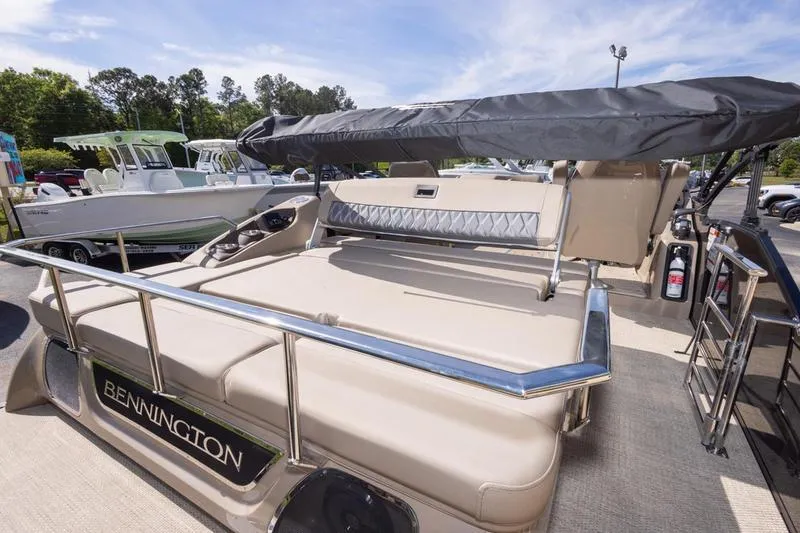 Slide: The Image of 2023 Bennington R23 Swingback pontoon boat with sunshade and spacious seating area. - 16