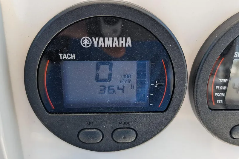 Slide: The Image of Yamaha tachometer display on 2022 Key West 230 Bay Reef boat, showing 36.4 hours. - 15
