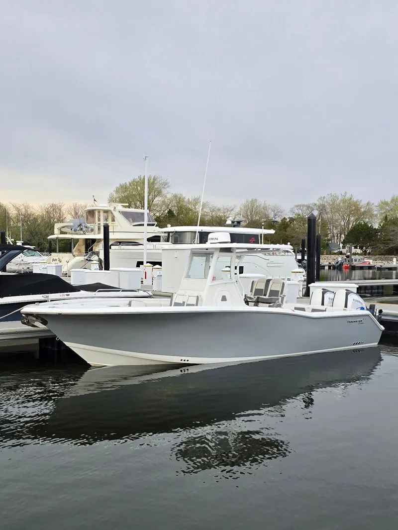 The Image of 2018 Tidewater 280 CC Adventure boat docked at marina. - 0
