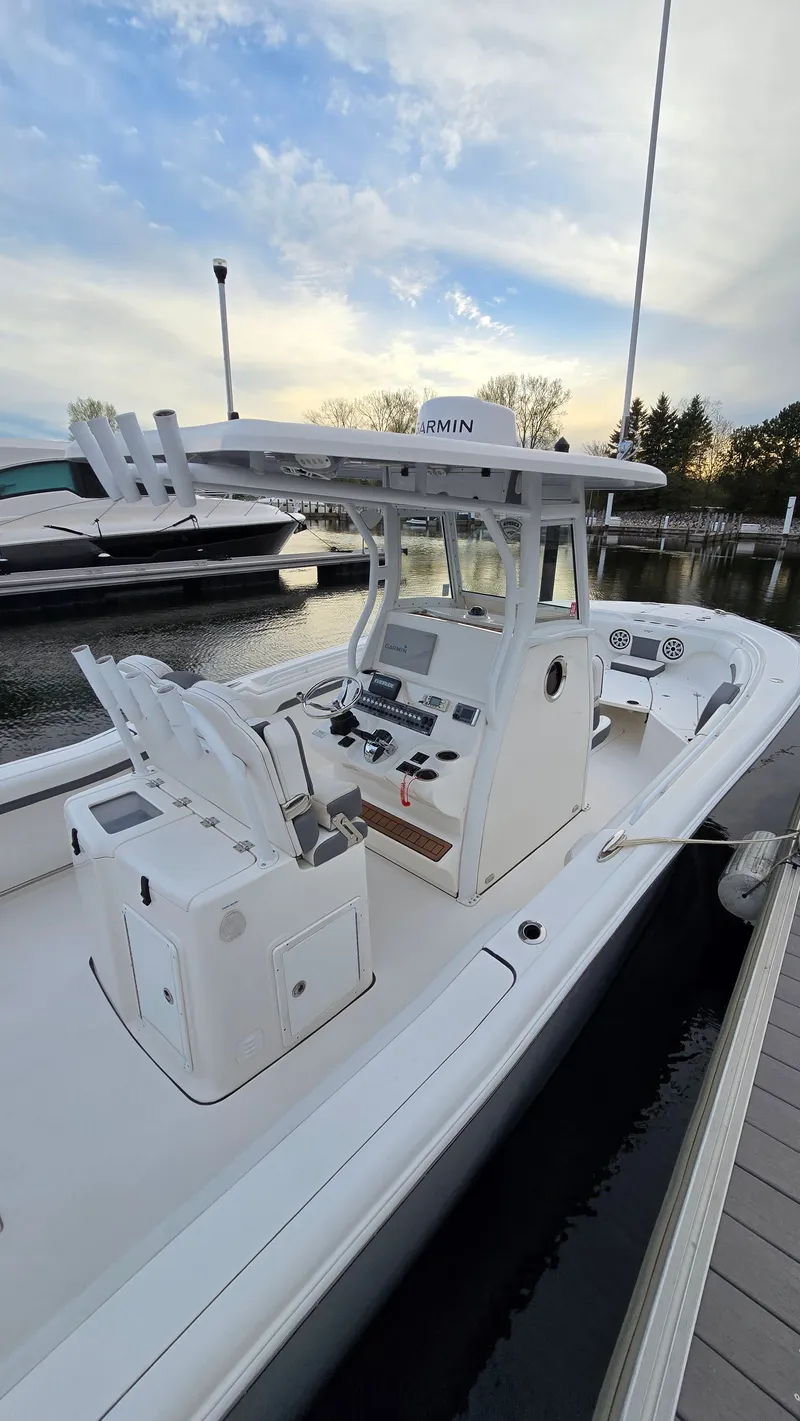 Slide: The Image of 2018 Tidewater 280 CC Adventure boat at dock. - 4