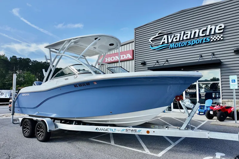 The Image of 2024 Sea Fox 228 Commander boat on trailer at Avalanche Motorsports dealership. - 0