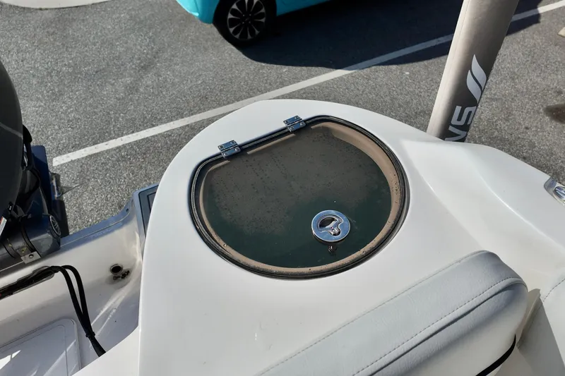 Slide: The Image of 2024 Sea Fox 228 Commander boat hatch with secure latch on deck. - 11