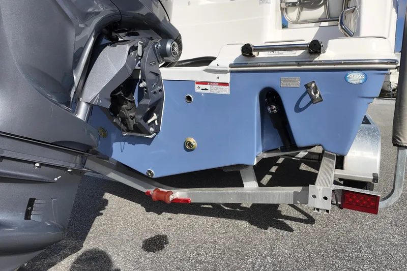 Slide: The Image of 2024 Sea Fox 228 Commander boat stern with motor mount and trailer. - 16