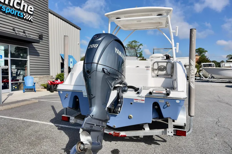 Slide: The Image of 2024 Sea Fox 228 Commander boat with Yamaha 200 engine at dealership. - 17