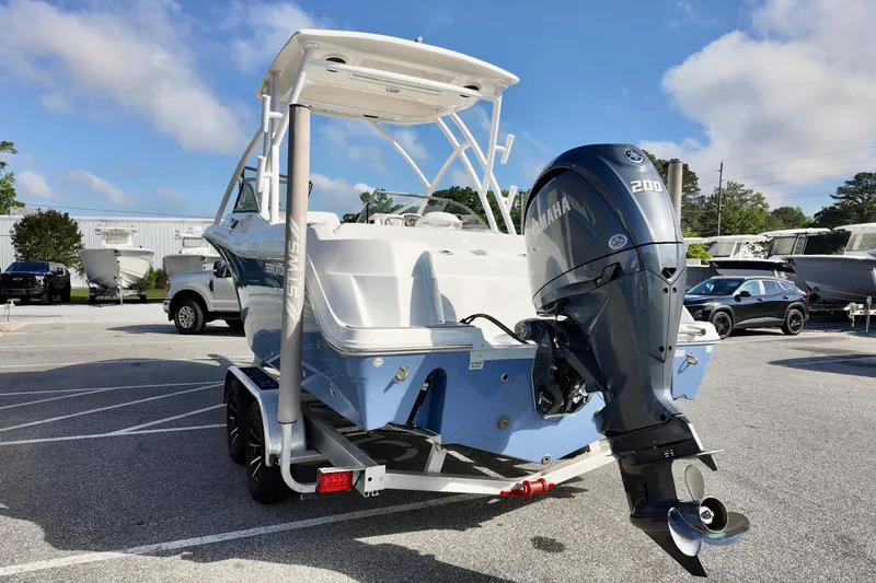 Slide: The Image of 2024 Sea Fox 228 Commander boat with Yamaha 200 engine on trailer. - 18