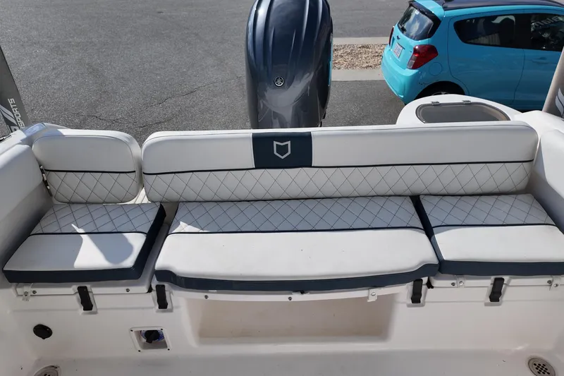 Slide: The Image of 2024 Sea Fox 228 Commander boat seating with diamond-pattern upholstery. - 23