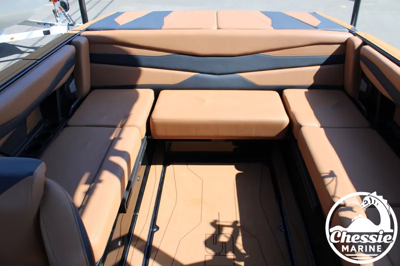 Slide: The Image of Interior of Axis A225 boat, 2026 model, featuring beige leather seating. - 12