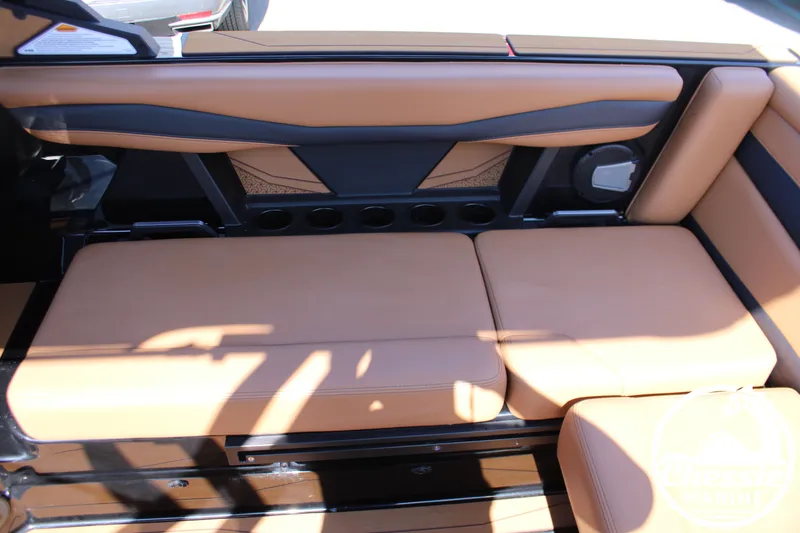 Slide: The Image of Interior of Axis A225 boat, brown upholstery, model year 2026. - 13