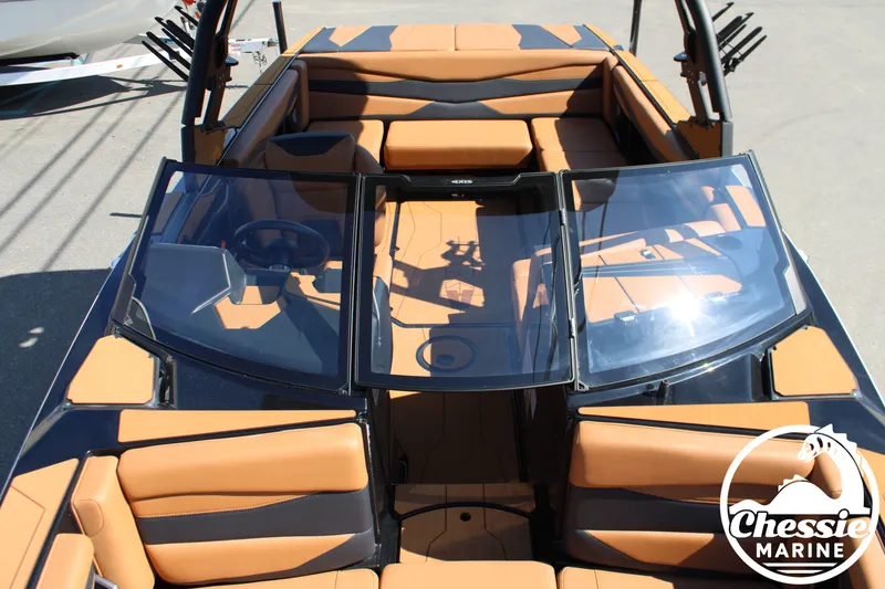 Slide: The Image of Interior view of Axis A225 boat, 2026 model, featuring brown leather seats. - 26