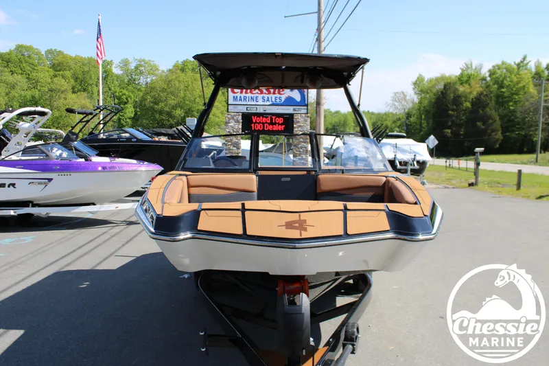 Slide: The Image of Axis A225 boat 2026 displayed outdoors at Chessie Marine Sales. - 8