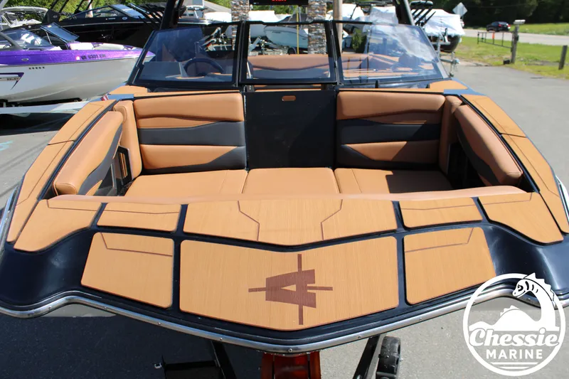 Slide: The Image of Axis A225 2026 boat with brown upholstery and modern design. - 9