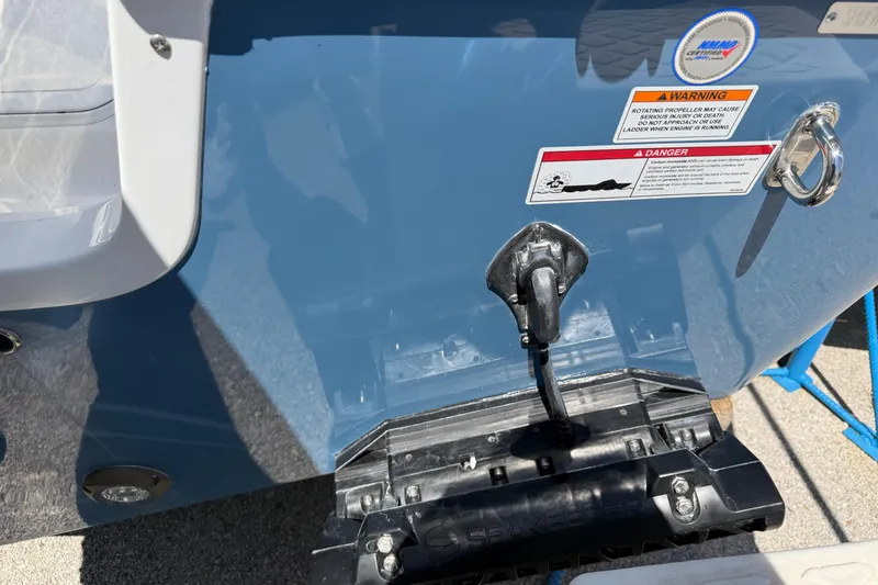 Slide: The Image of Rear view of a 2026 Sea Pro 242 Center Console boat. - 12