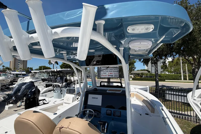 Slide: The Image of 2026 Sea Pro 242 Center Console boat at the marina. - 3
