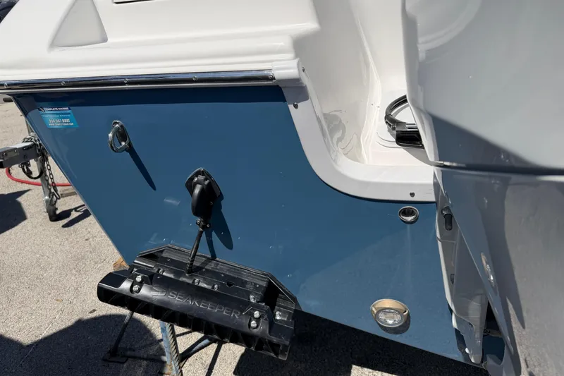 Slide: The Image of 2026 Sea Pro 242 Center Console boat hull with Seakeeper stabilizer. - 37