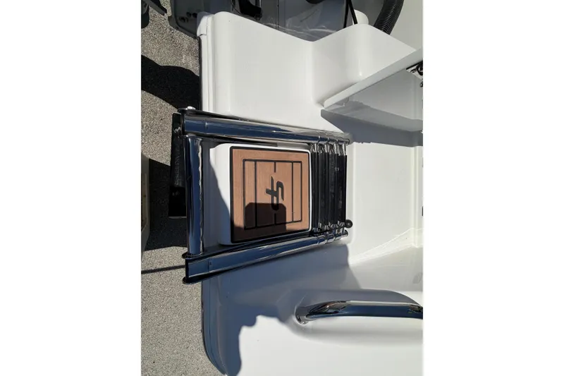 Slide: The Image of 2026 Sea Pro 242 Center Console boat ladder detail view. - 43