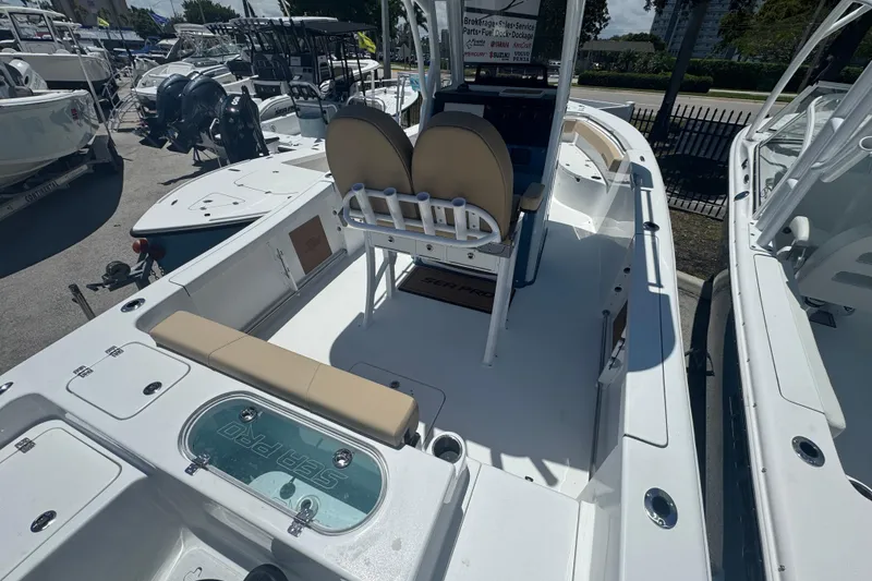 Slide: The Image of 2026 Sea Pro 242 Center Console boat on display in a lot. - 9