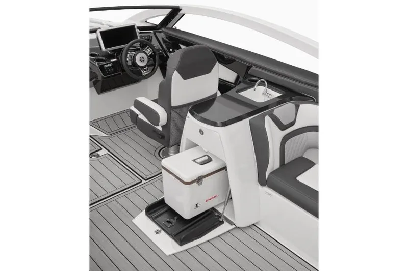 Slide: The Image of Manufacturer Provided Image: 2022 Yamaha Boats 275SD interior with helm, seating, and storage. - 7