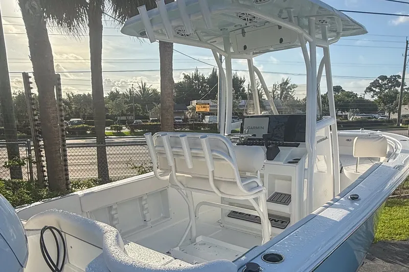 Slide: The Image of 2026 Sea Hunt Ultra 219 boat with modern features. - 3