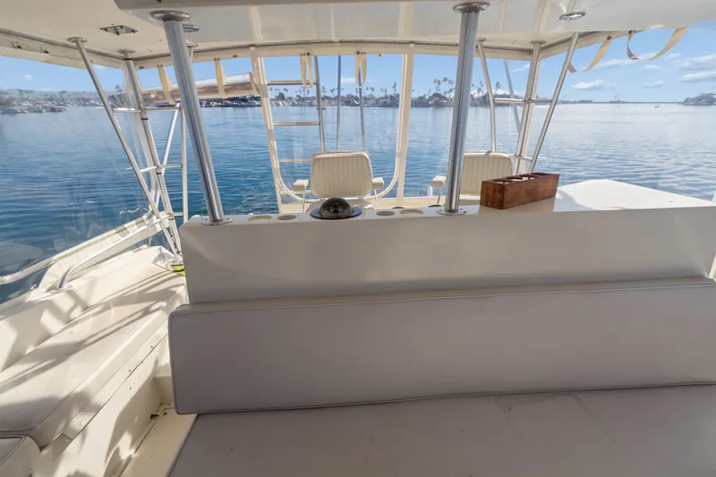 Slide: The Image of Interior view of 1988 Viking 48 Convertible yacht with ocean backdrop. - 19