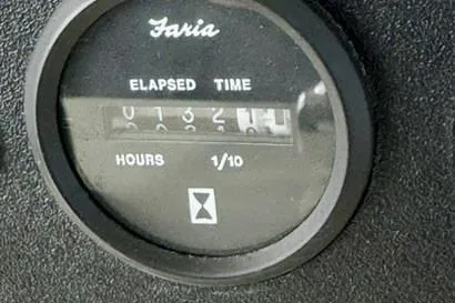 Slide: The Image of Hour meter showing 1321.4 hours on 1988 Viking 48 Convertible. - 23