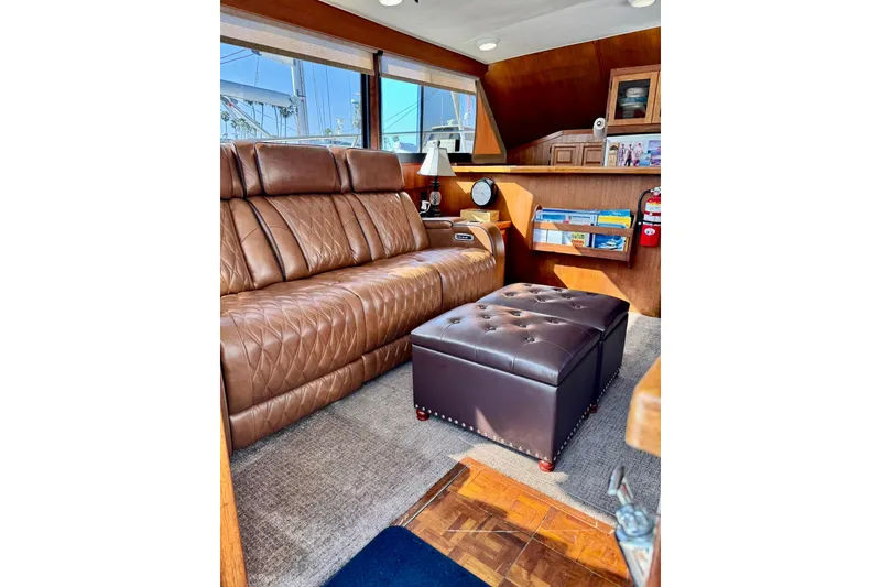 Slide: The Image of Luxurious interior of a 1988 Viking 48 Convertible yacht with leather seating. - 25