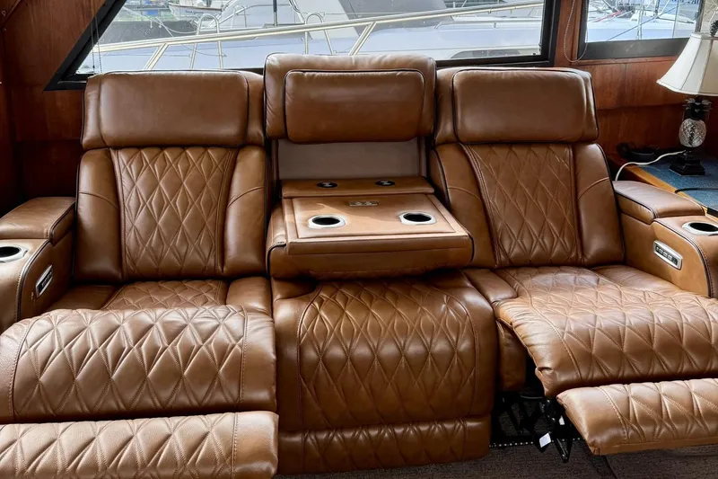 Slide: The Image of Luxurious brown leather recliners on a 1988 Viking 48 Convertible yacht interior. - 37