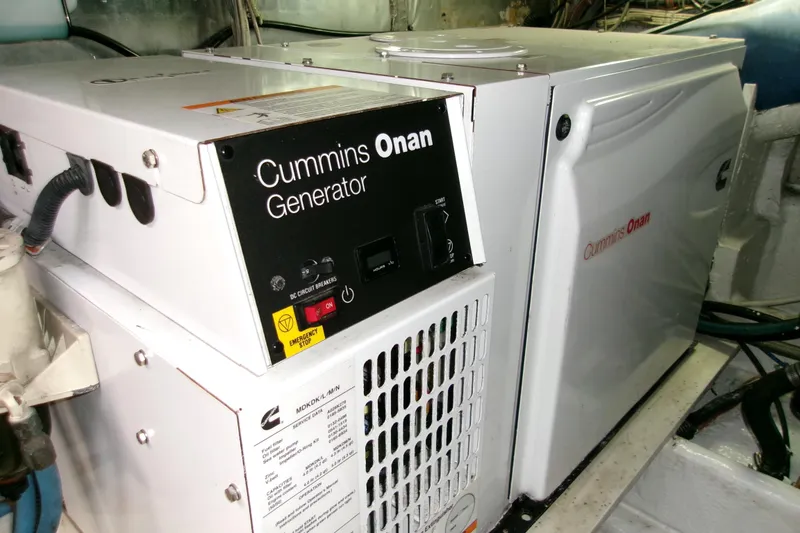 Slide: The Image of Cummins Onan generator in 1988 Viking 48 Convertible yacht engine room. - 50