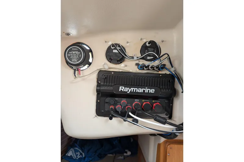 Slide: The Image of Raymarine marine electronics setup on 1986 Express 37 sailboat, featuring Sony components. - 53