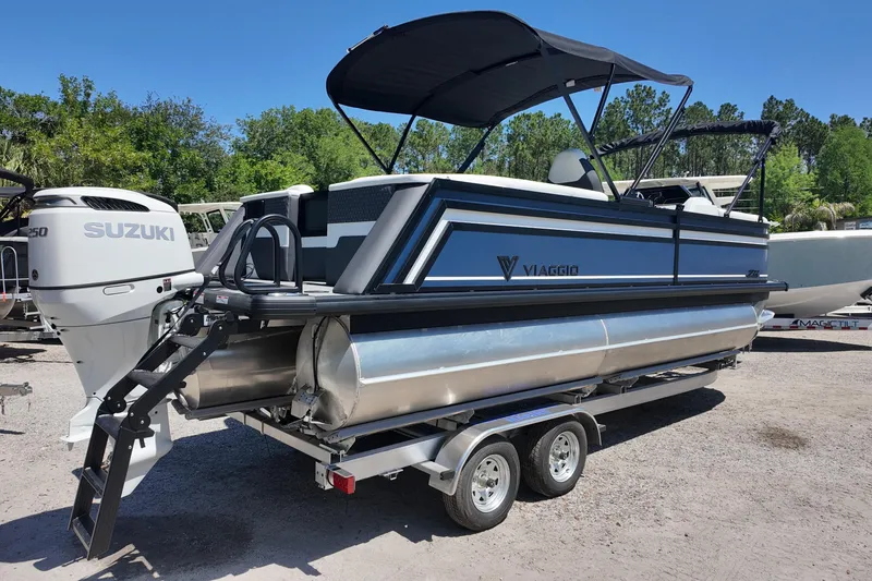 Slide: The Image of 2026 Viaggio Lago Z-U 22 pontoon boat with Suzuki engine on trailer. - 2