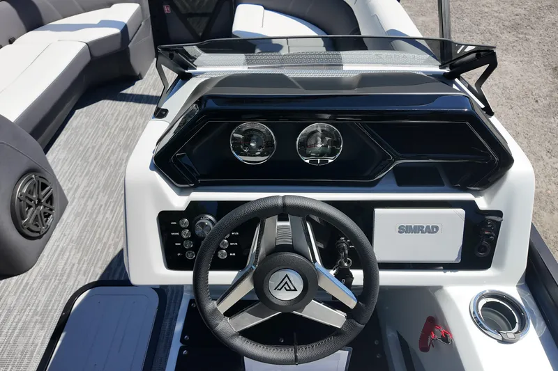 Slide: The Image of Viaggio Lago Z-U 22 boat dashboard, featuring modern controls and Simrad navigation system, 2026 model. - 5