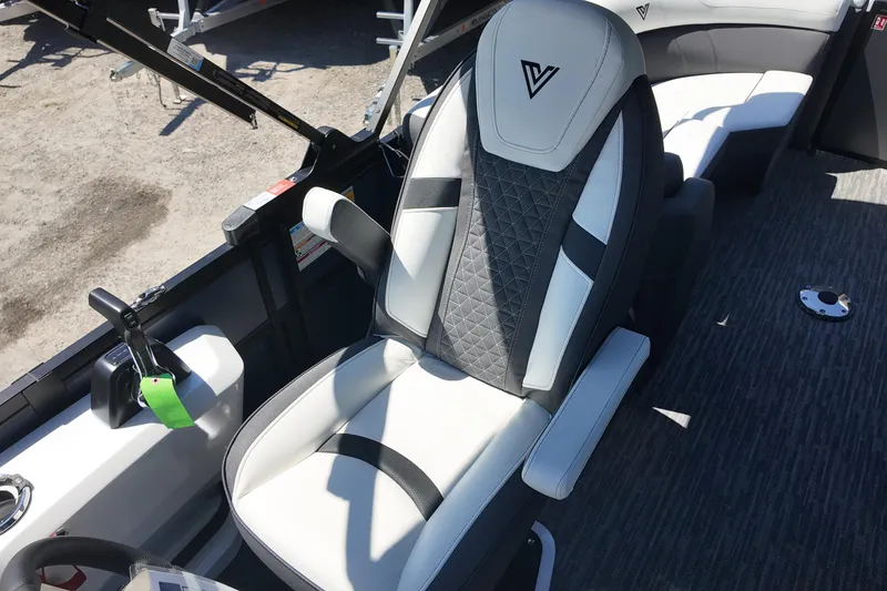 Slide: The Image of Captain's seat in 2026 Viaggio Lago Z-U 22 boat, featuring modern design and controls. - 9