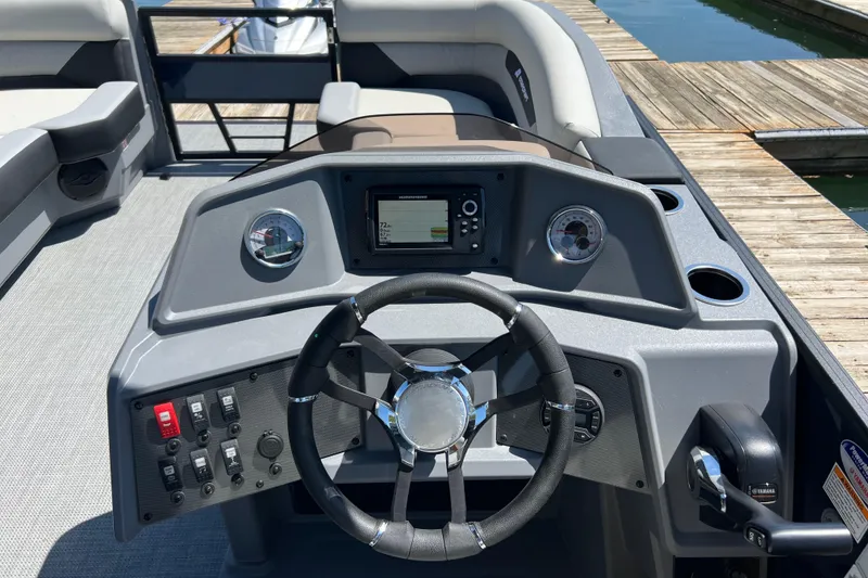 Slide: The Image of Steering console of 2026 Starcraft VX 22 R DH boat at dockside. - 15
