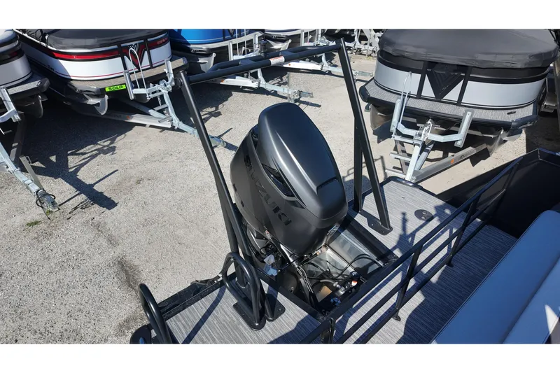 Slide: The Image of 2026 Viaggio Diamante S 22 boat with Suzuki outboard motor, parked on a trailer. - 12