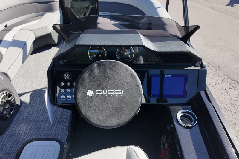 Slide: The Image of Steering console of 2026 Viaggio Diamante S 22 boat with Gussi Italia wheel cover. - 5
