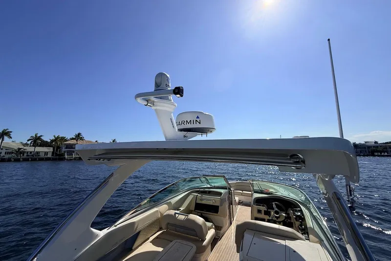 Slide: The Image of 2019 Regal 33 OBX boat with Garmin radar on sunny day. - 14