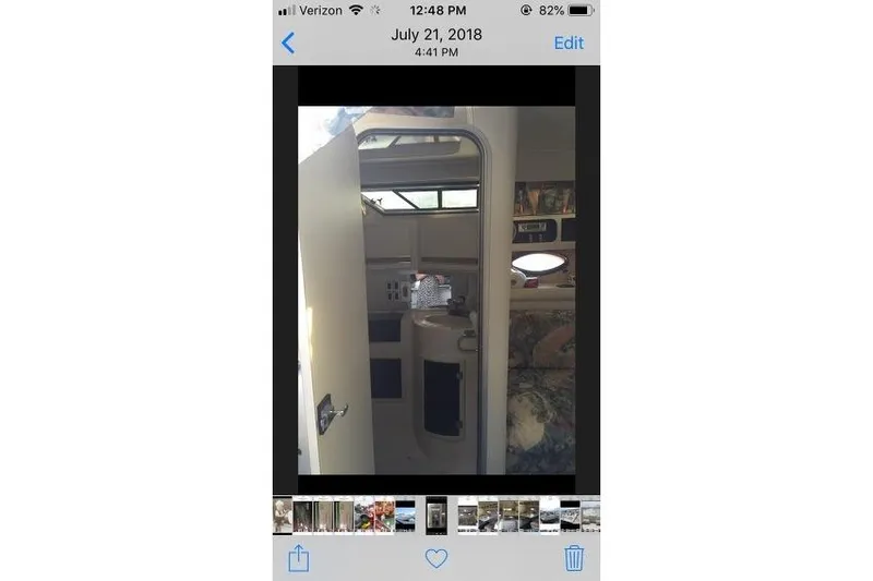 Slide: The Image of Interior view of a 1989 Wellcraft 3200 St. Tropez boat cabin. - 10
