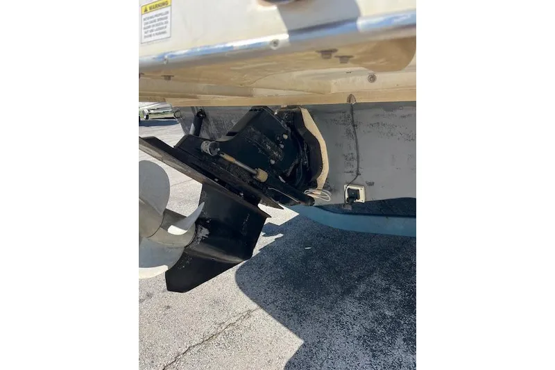 Slide: The Image of 2007 Rinker Fiesta Vee 250 boat stern drive and propeller detail. - 23