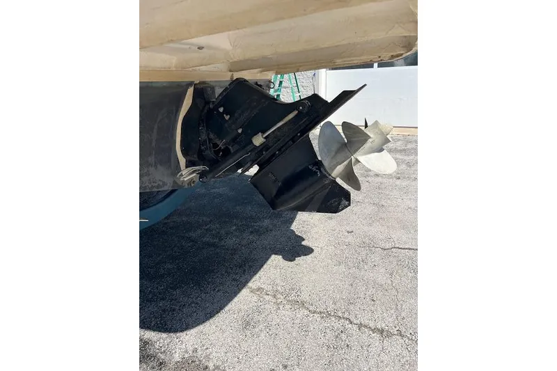Slide: The Image of 2007 Rinker Fiesta Vee 250 boat propeller and stern drive detail. - 24