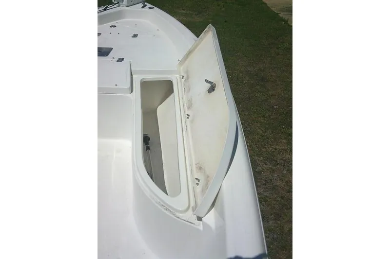 Slide: The Image of Open storage compartment on 2008 NauticStar 2110 Nautic Bay boat deck. - 15