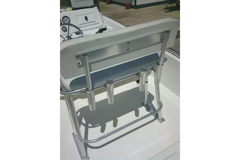 Slide: The Image of 2008 NauticStar 2110 Nautic Bay boat interior with seating and rod holders. - 28