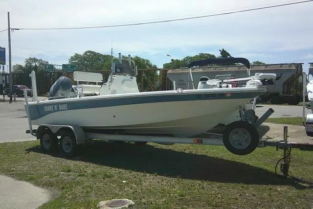 Slide: The Image of 2008 NauticStar 2110 Nautic Bay boat on trailer, parked outdoors. - 3