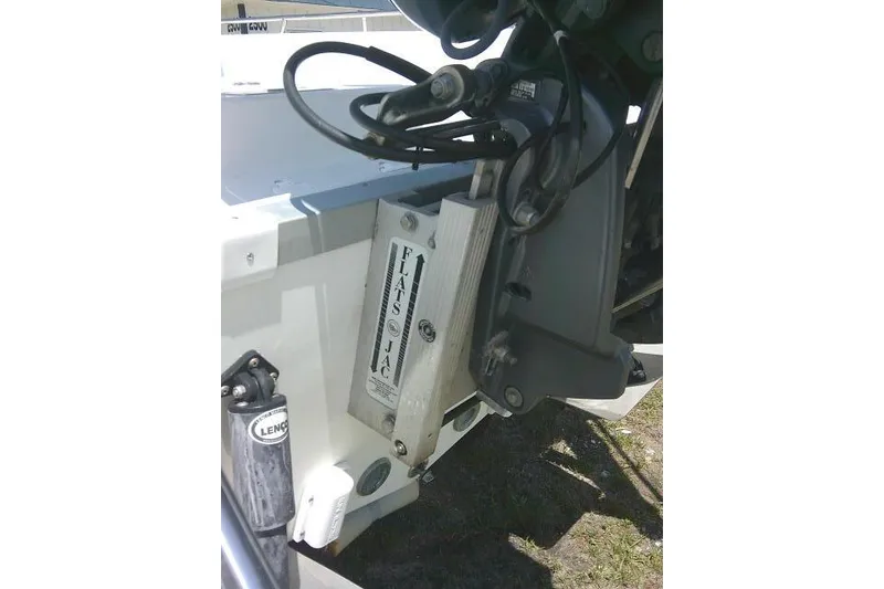 Slide: The Image of 2008 NauticStar 2110 Nautic Bay boat engine with Flats Jac hydraulic jack plate. - 9