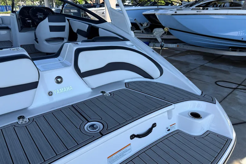 Slide: The Image of 2023 Yamaha Boats 195S interior with sleek seating and modern design. - 13
