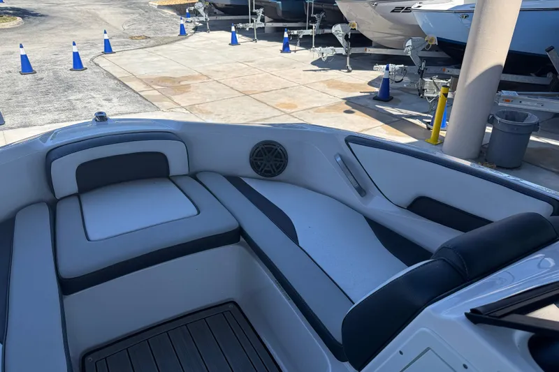Slide: The Image of 2023 Yamaha Boats 195S interior with sleek seating and modern design. - 18